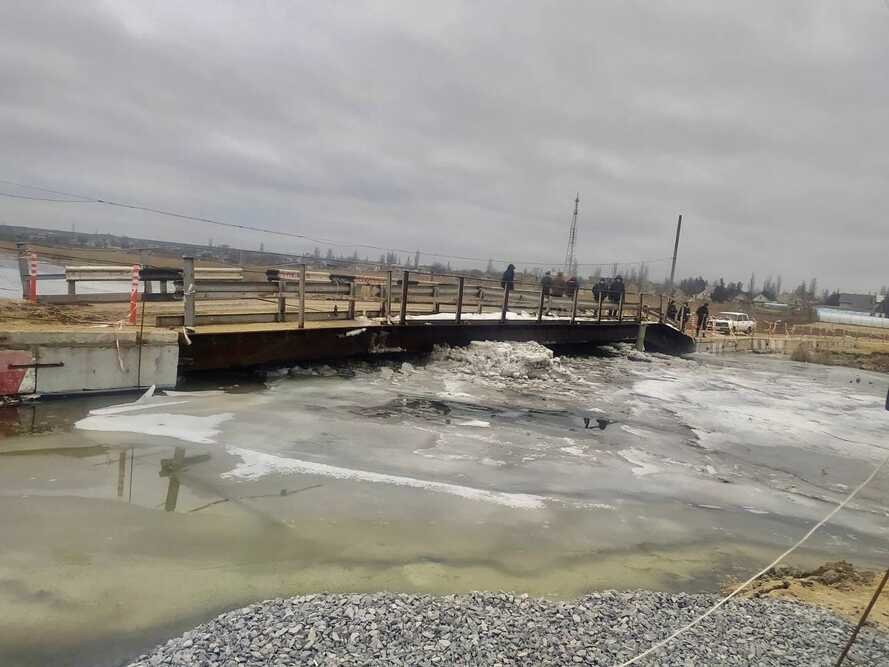 Под Николаевом отремонтировали мост, который затопил грузовик: до конца пода обещают построить новую переправу,- ФОТО, ВИДЕО  